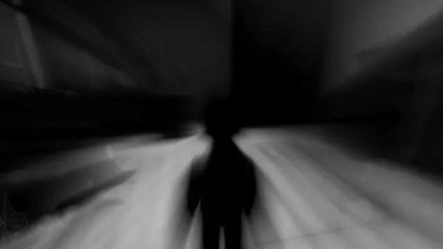 Lucius, a silhouette in a dark, blurred corridor, in black and white
